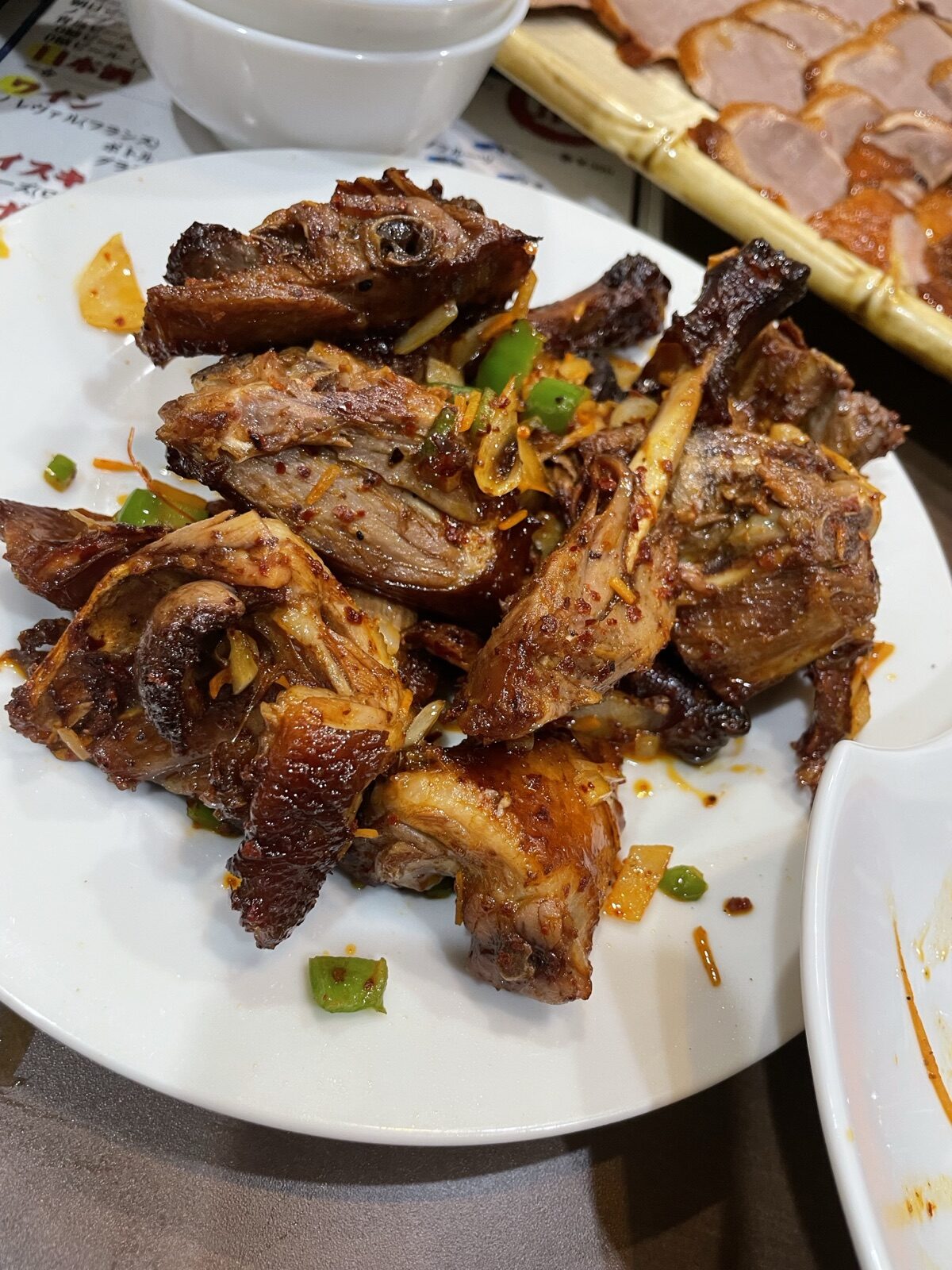 一家人の鴨架の二度焼き（鴨ガラの香味炒め・北京ダックコース二品目）